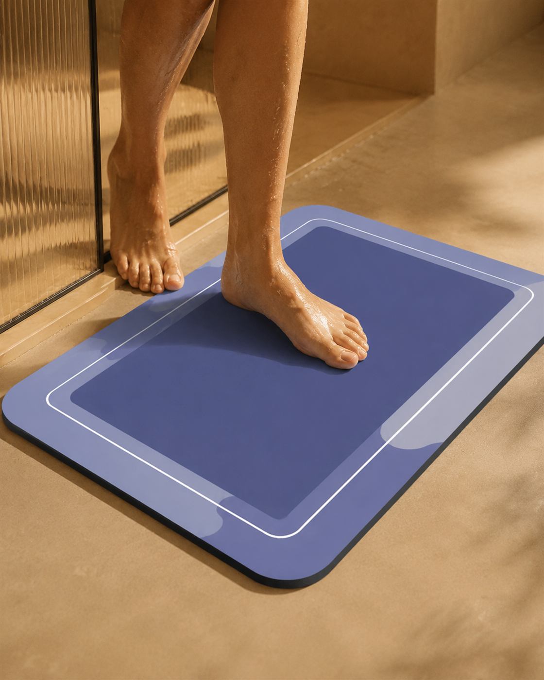 Bare feet stepping onto the quick-dry bath mat after a shower